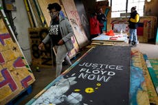 Artistas y activistas se apresuran a salvar los murales de BLM