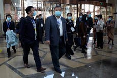 Investigadores OMS se reúnen con expertos chinos en Wuhan