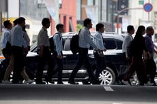 Funcionarios japoneses castigados por salir del trabajo dos minutos antes
