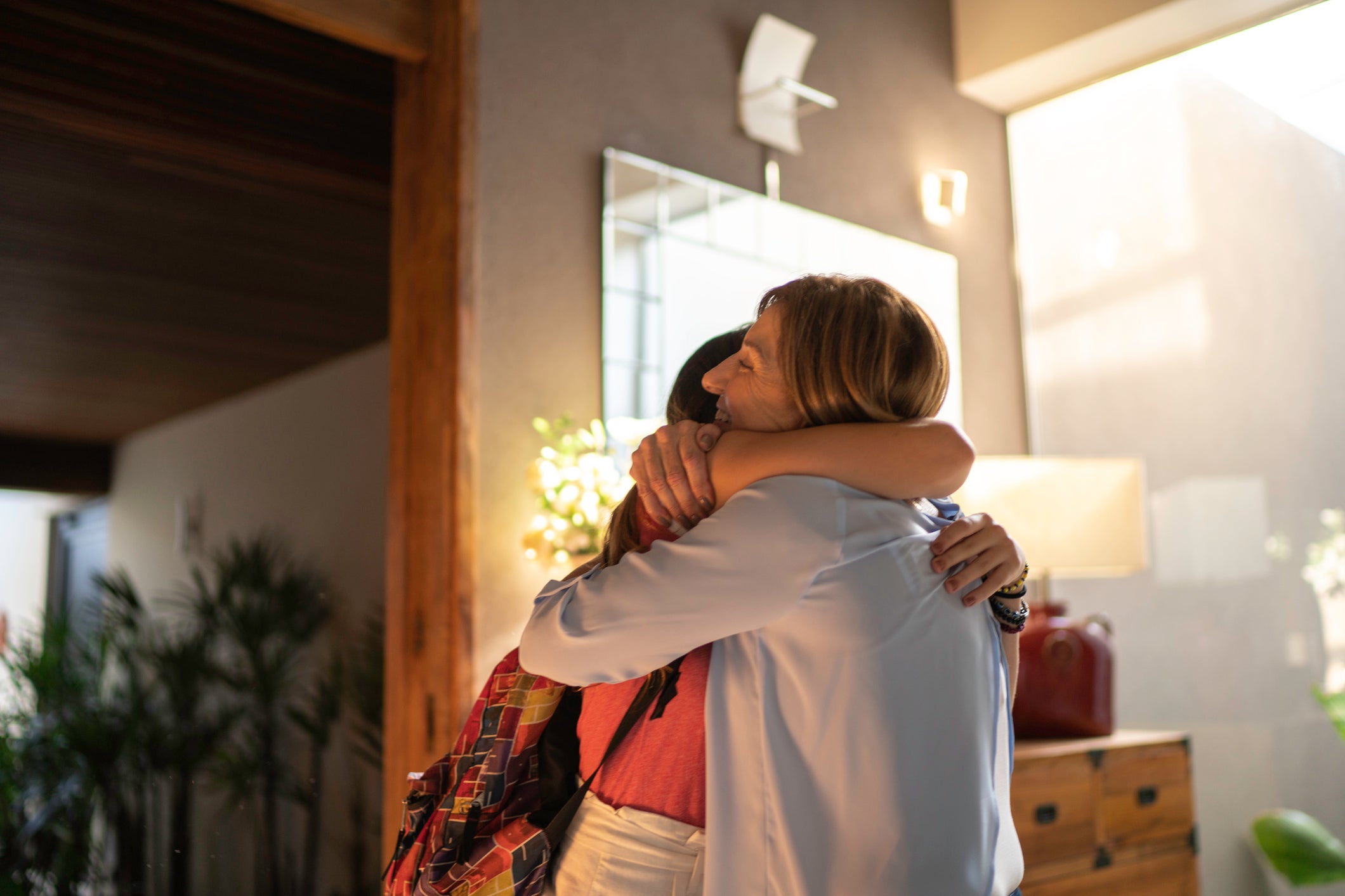 People can resume close contact with friends and family, including hugging