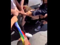 Familia comparte video del impactante ataque a menor no binarie por usar una bandera del Orgullo