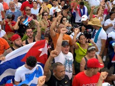 Las protestas de Cuba se extienden a Miami, mientras el presidente amenaza con una “batalla en las calles”