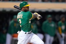 Harrison y Marte guían a Atléticos a triunfo ante Gigantes