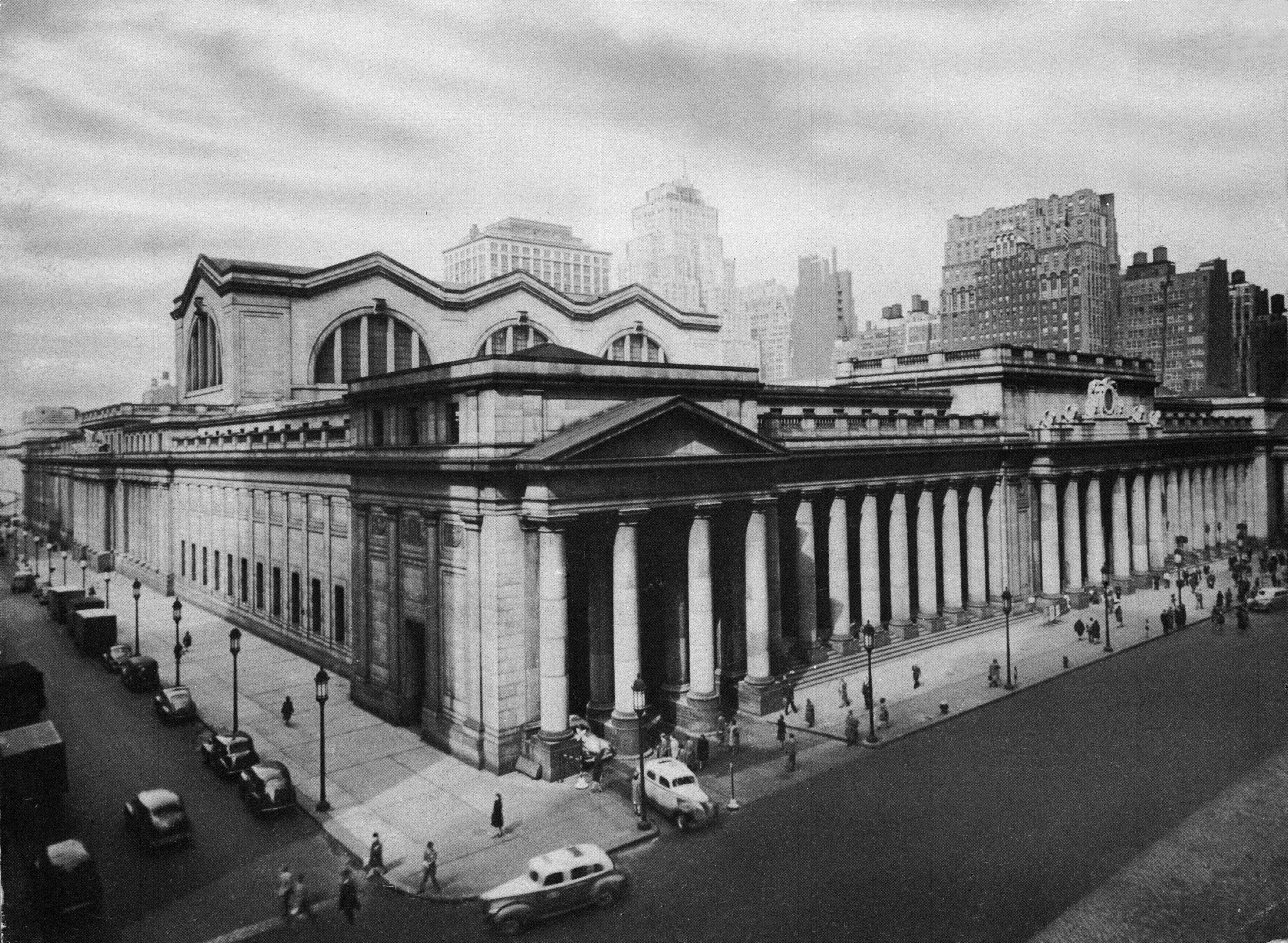 Pennsylvania Station in New York pictured from the corner of Seventh Avenue, circa 1940