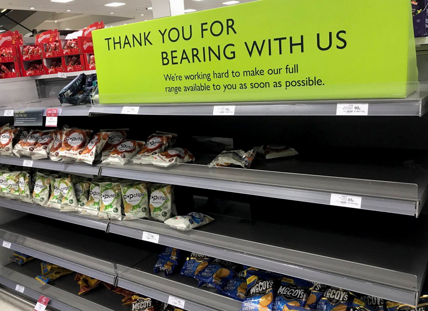 Empty crisp shelves pictured at a Waitrose supermarket in Canary Wharf, London