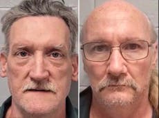 Dos hombres acusados del asesinato de mujeres fotografiadas en una jaula