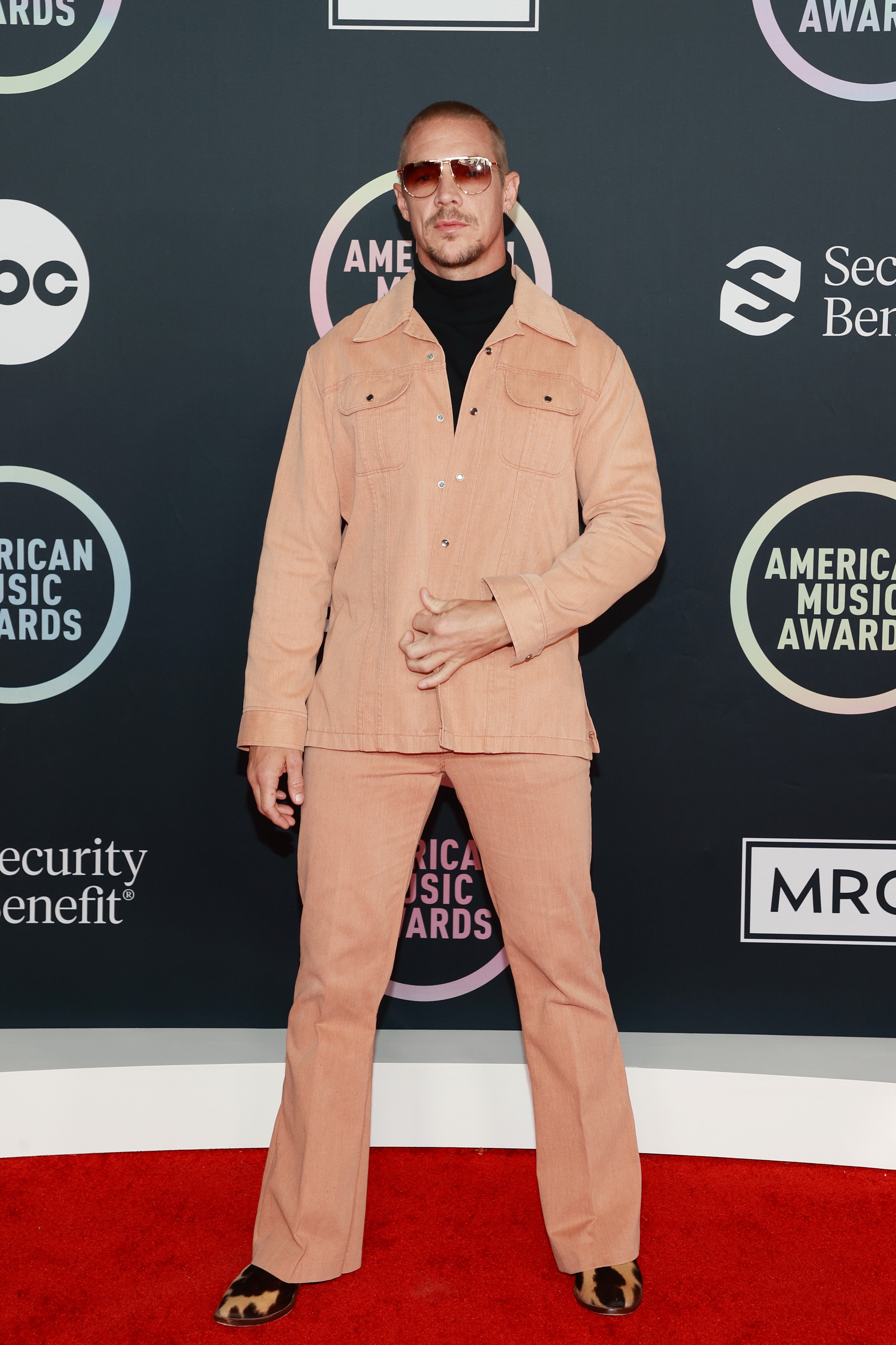 Diplo chose a pale peach suit, which he paired with animal-print shoes