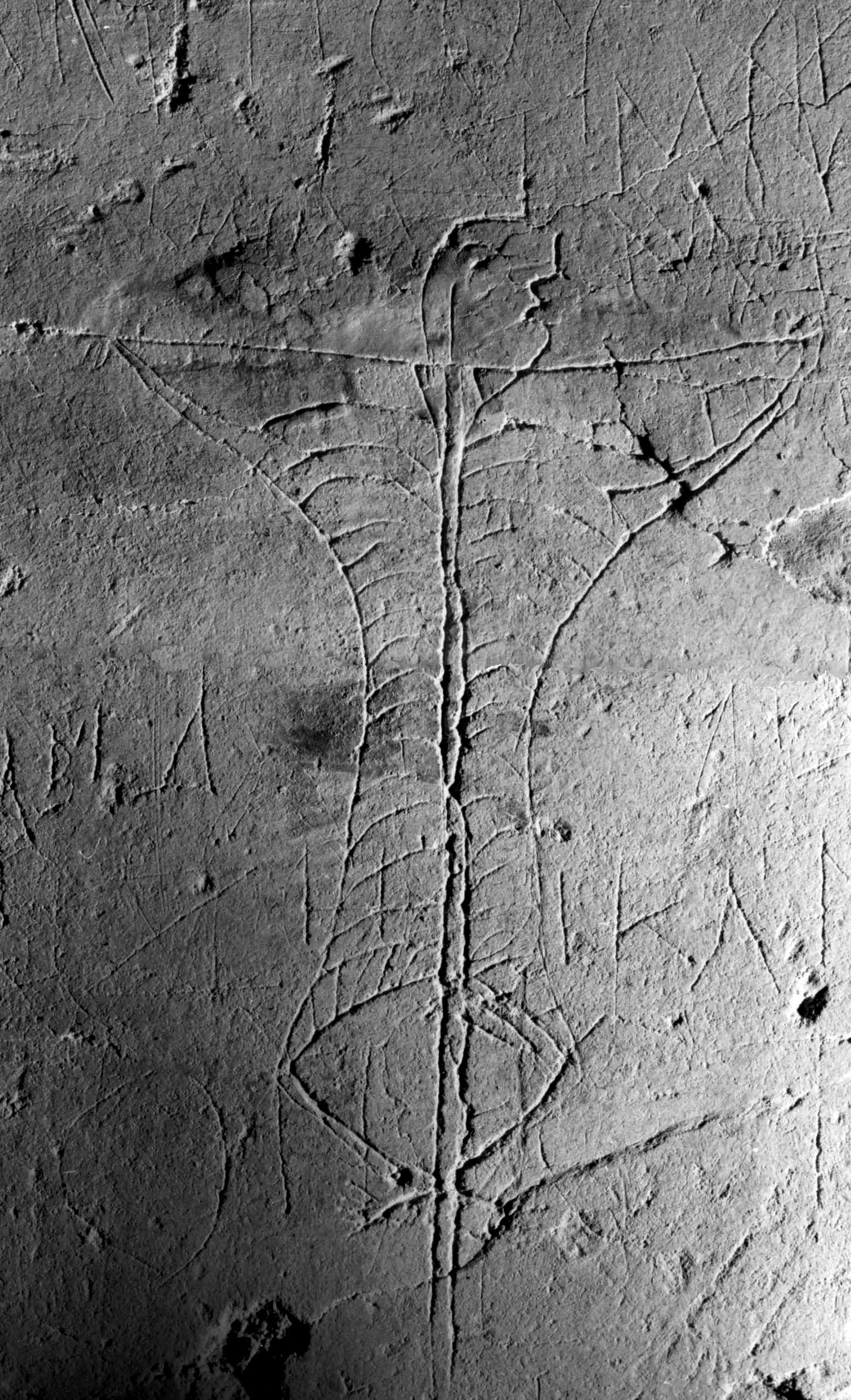 Este grafitti del siglo II después de Cristo encontrado en una antigua taberna romana en Puteoli, Italia es la representación más antigua conocida de una crucifixión