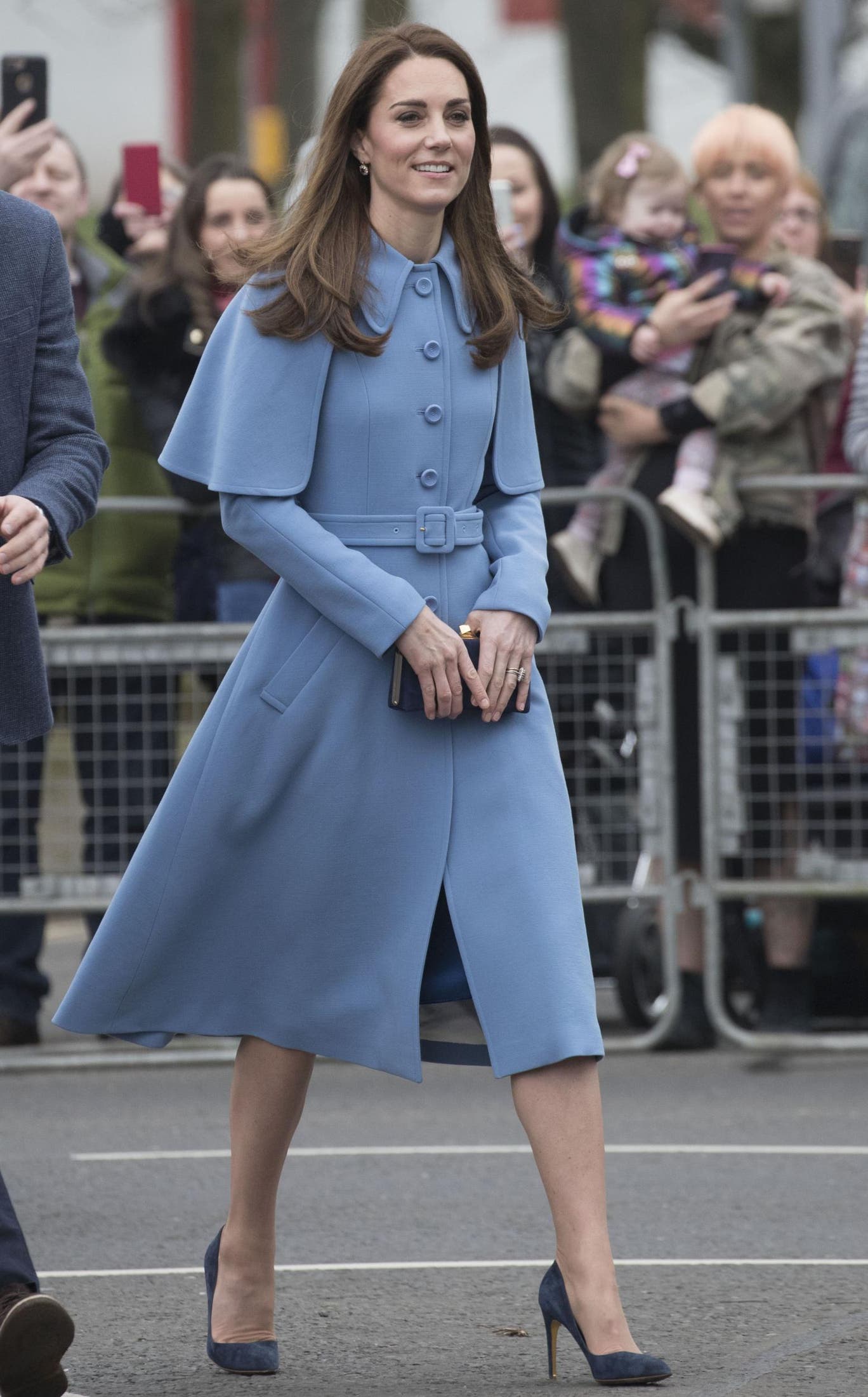 Kate arrived in a grey-blue coat