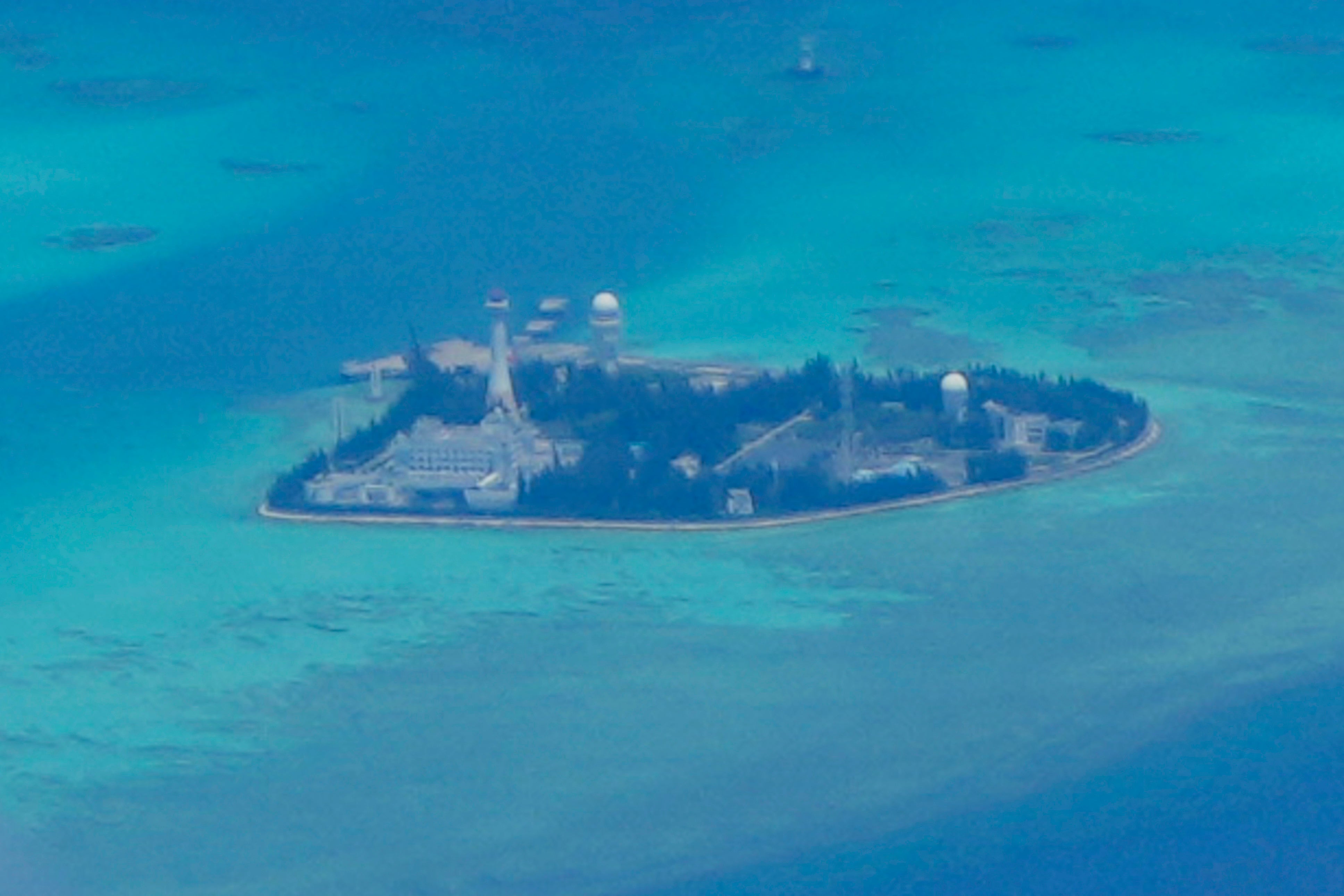 Chinese structures and buildings at the man-made island on Johnson reef at the Spratlys group of islands in the South China Sea