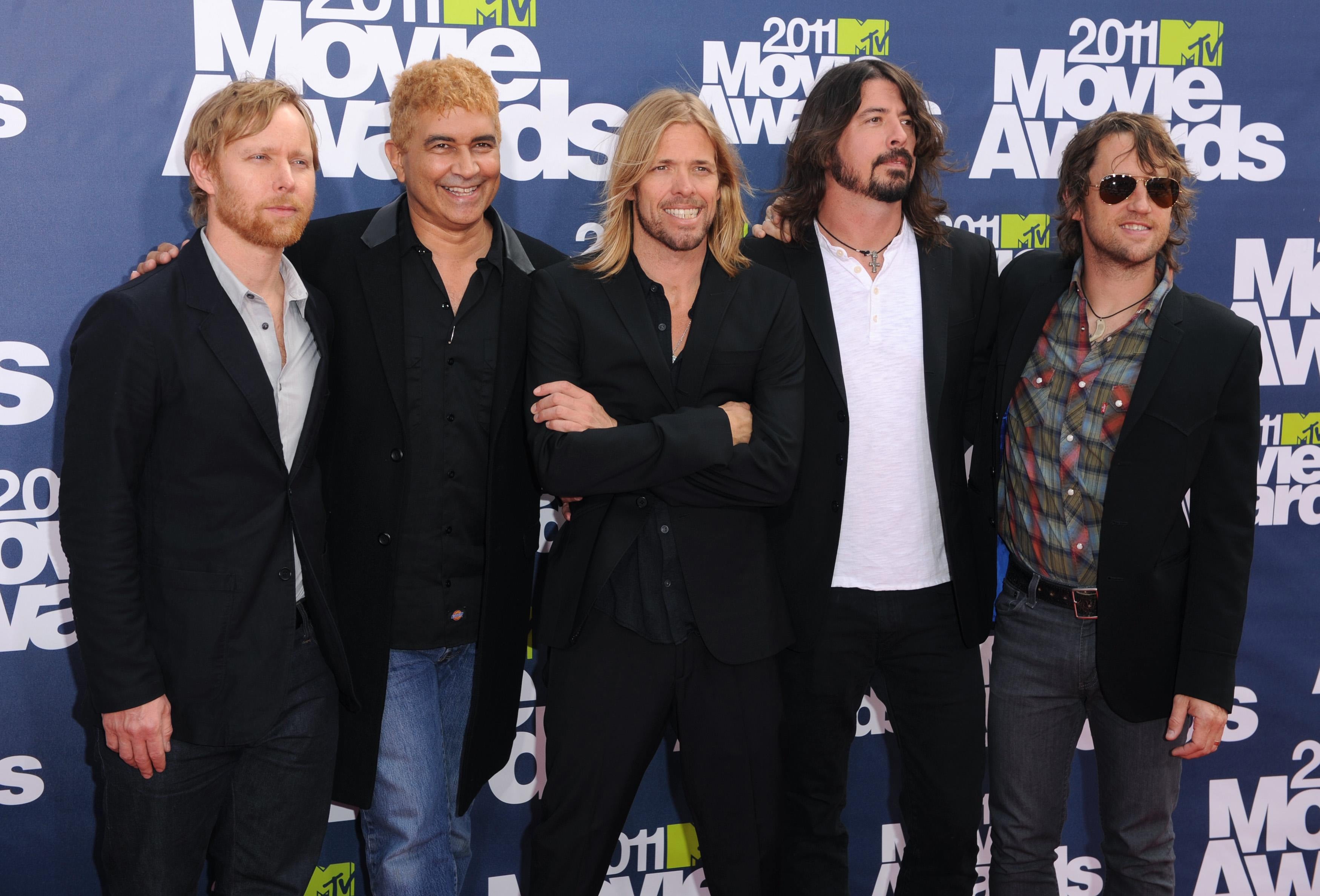 Taylor Hawkins con sus compañeros de Foo Fighters (de izquierda a derecha) Nate Mendel, Pat Smear, Taylor Hawkins, Dave Grohl y Chris Shiflett (PA)