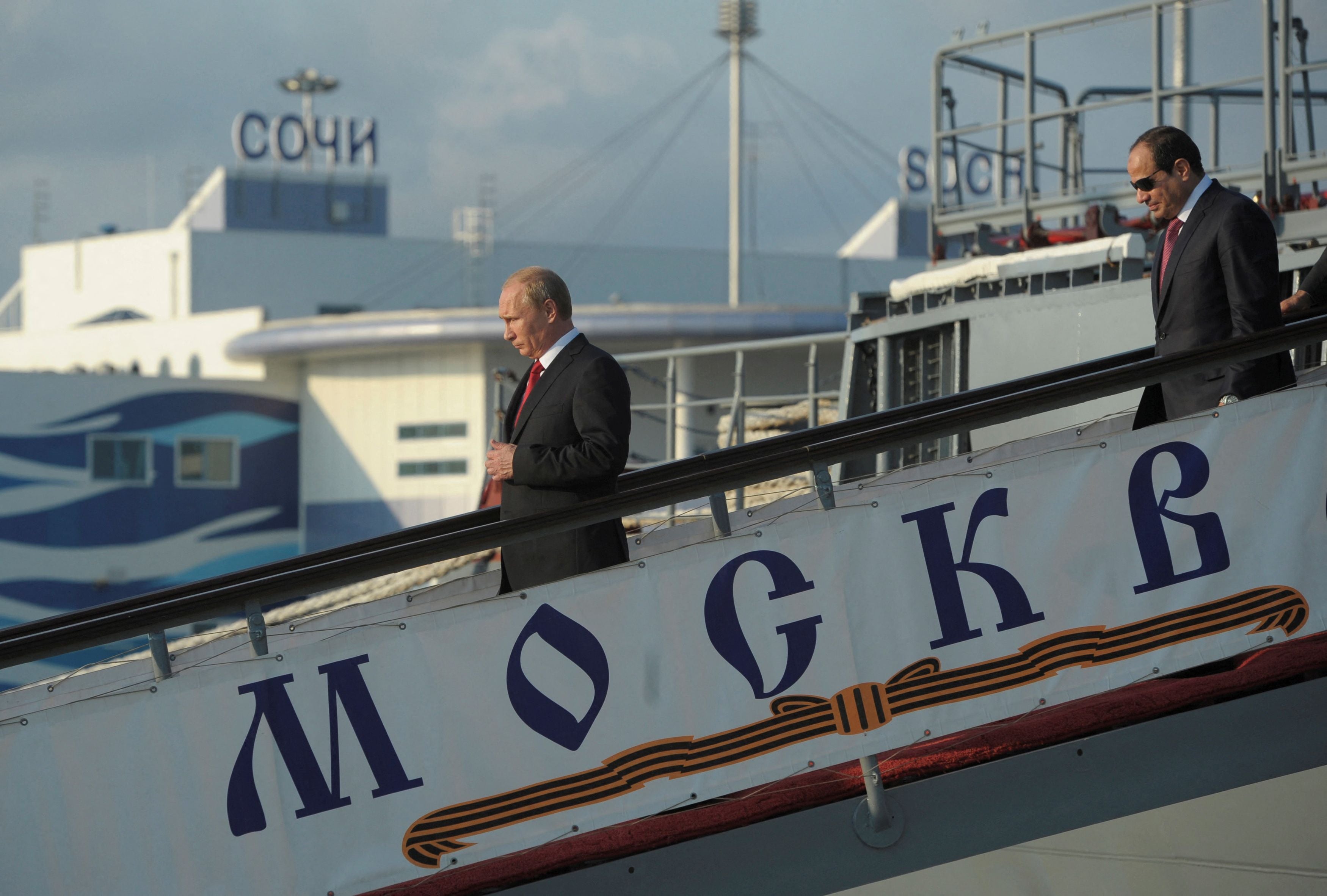 Vladimir Putin and his Egyptian counterpart Abdel Fattah al-Sisi leave the Moskva at the Black Sea port of Sochi, in August 2014