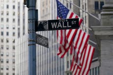 Wall Street abre mixto por posible alza de tasas de la Fed