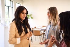 Publican fotos inéditas de Meghan Markle para celebrar su labor altruista