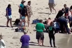 Dramático vídeo muestra a maestro de California arrastrado a la orilla después del ataque de un tiburón