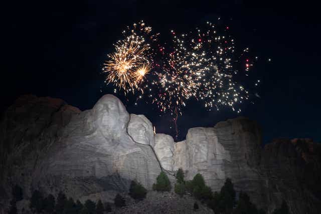 <p>Fireworks go off on July 3, 2020 over Mount Rushmore</p>