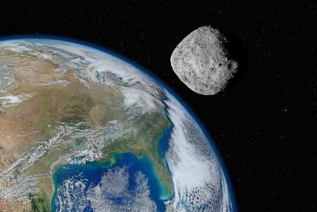 Concepción artística de un asteroide que pasa cerca de la Tierra