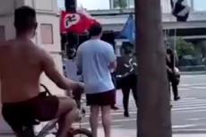 Un grupo neonazi organiza un pequeño mitin afuera de la cumbre Turning Point USA encabezada por Trump