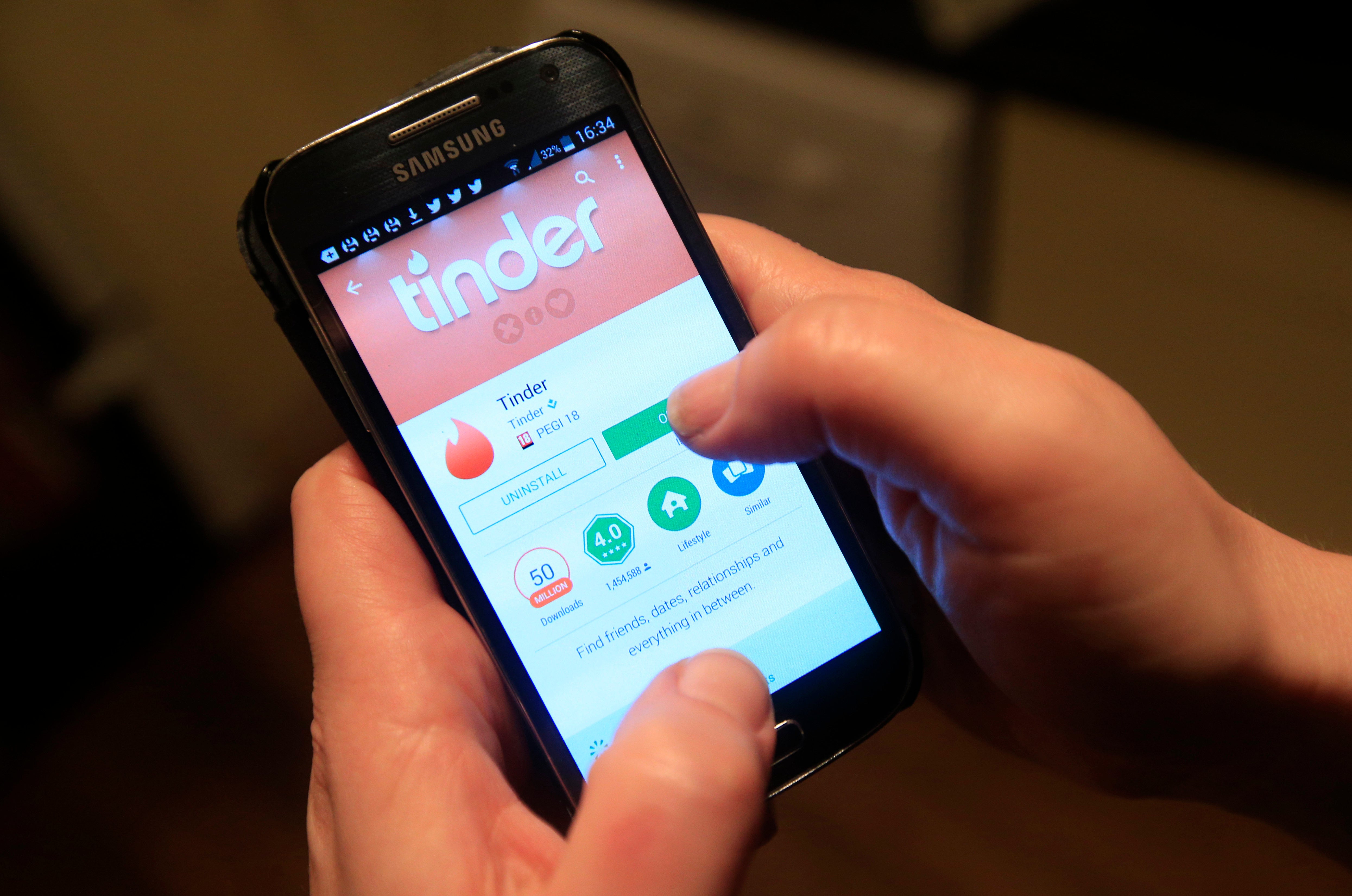 <p>The Tinder app in use on a Samsung smartphone.</p>