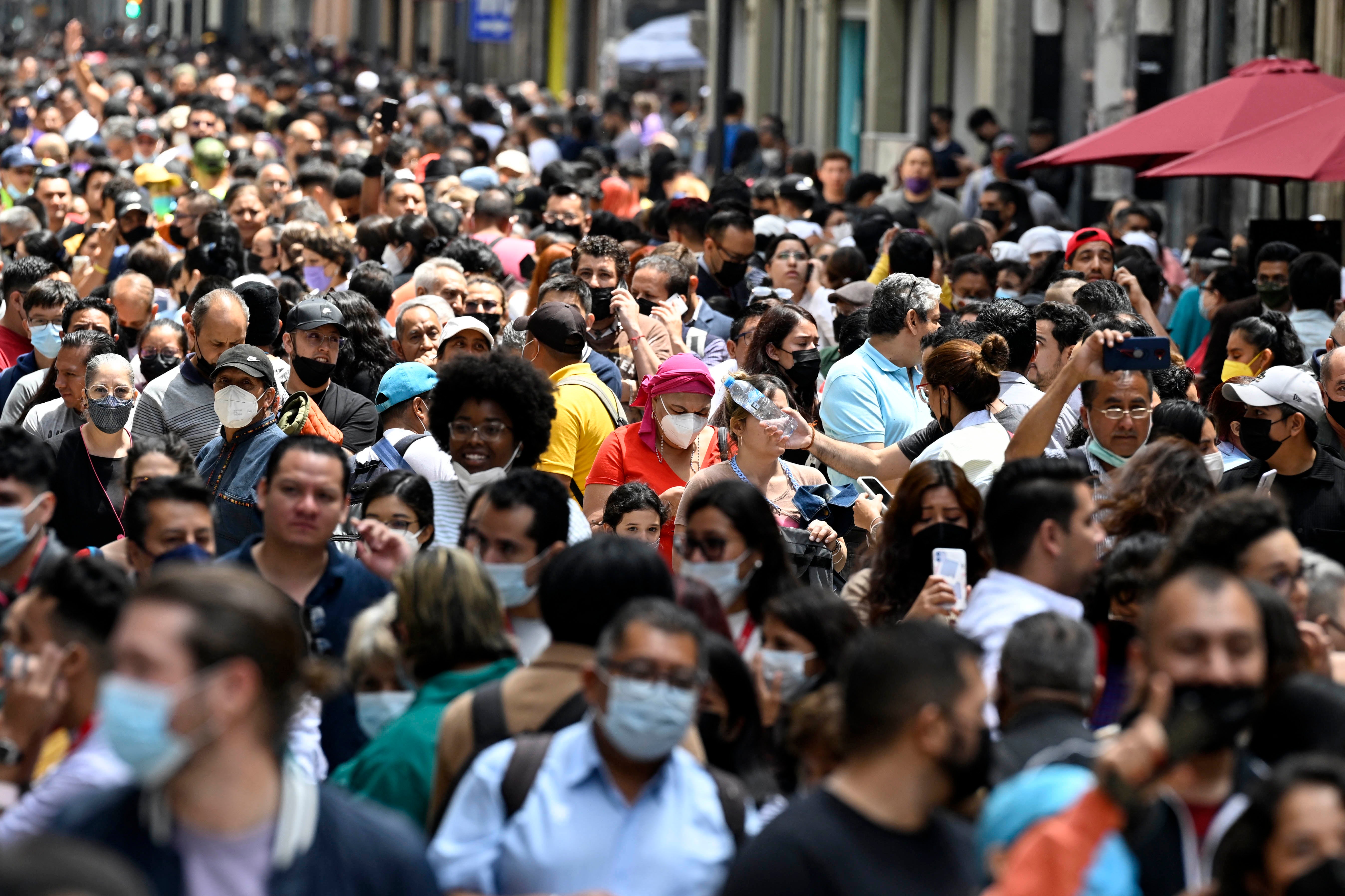 People are seen in the streets after an earthquake in Mexico City on September 19, 2022