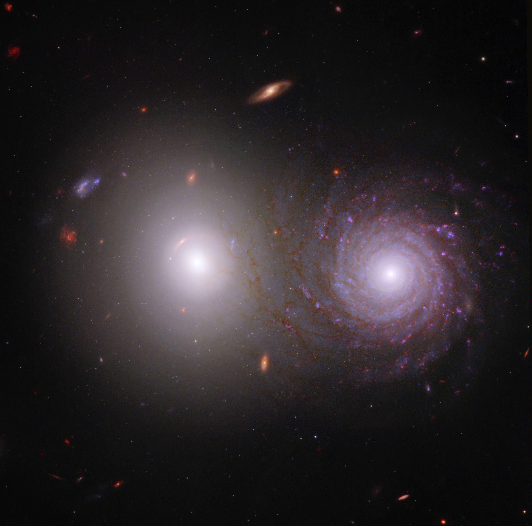La vista de dos galaxias al combinar datos de los telescopios espaciales Hubble y Webb