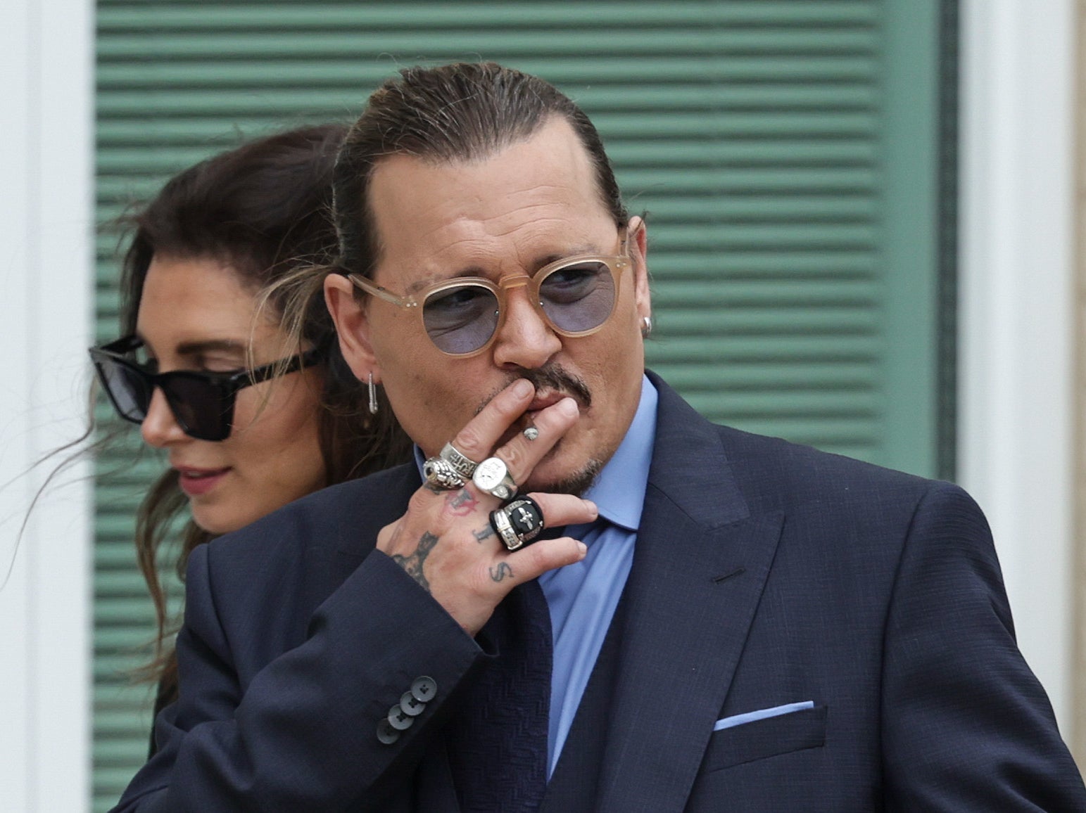 Depp smokes outside court during the defamation trial against ex-wife Amber Heard
