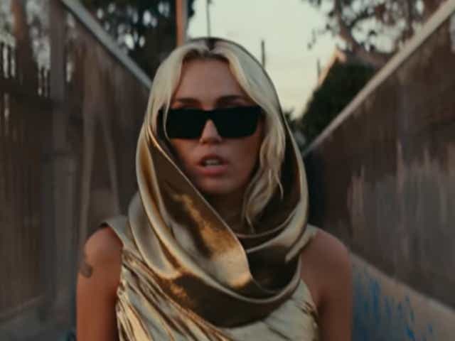 <p>Miley Cyrus in the ‘Flowers’ music video</p>