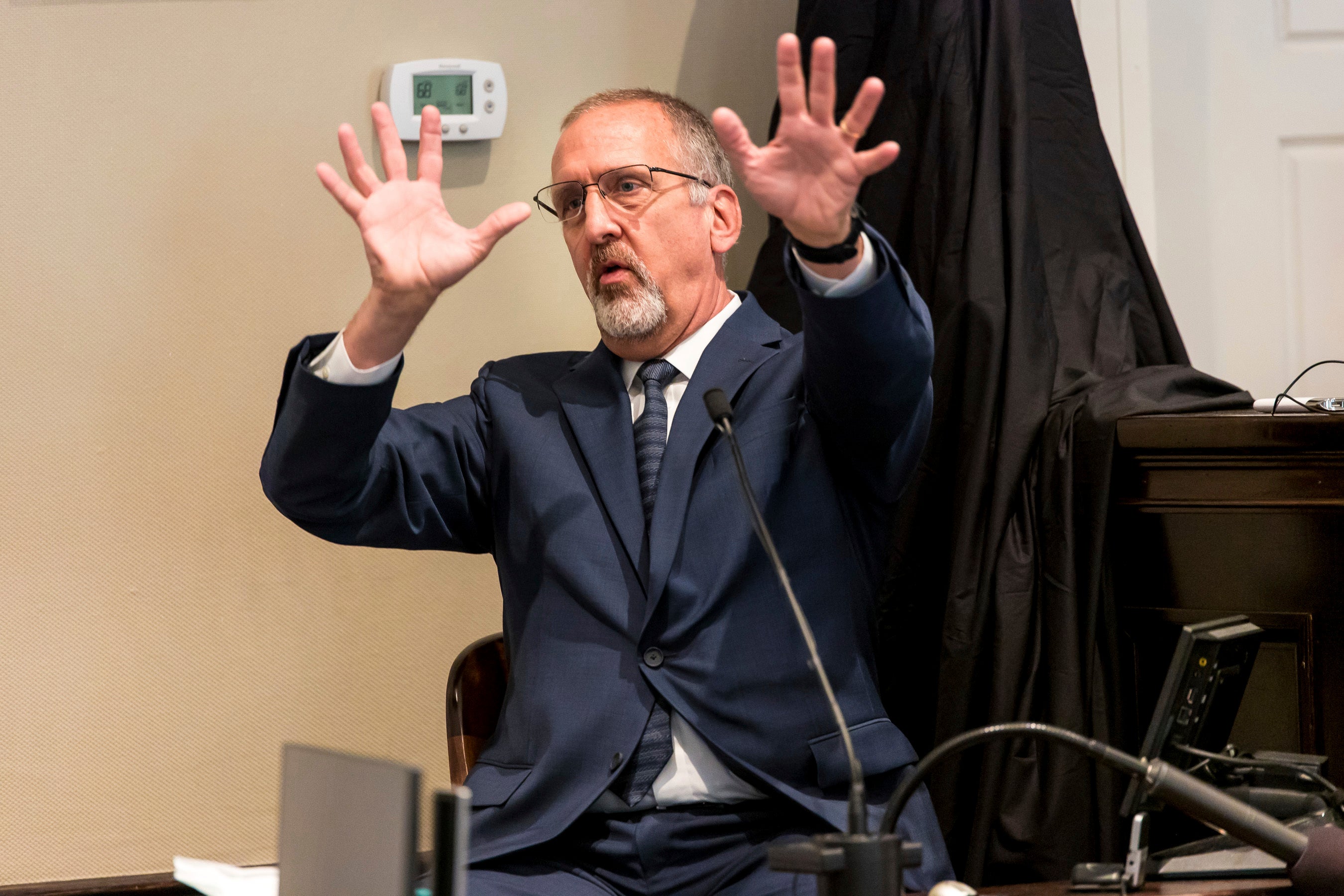 Tim Palmbach, a forensic scientist, demonstrates the affect of a shotgun blast during Alex Murdaugh's double murder trial