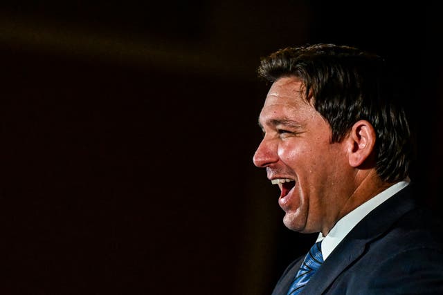 <p>Florida governor Ron DeSantis speaks during a primary election night event in Hialeah, Florida, on 23 August 2022</p>