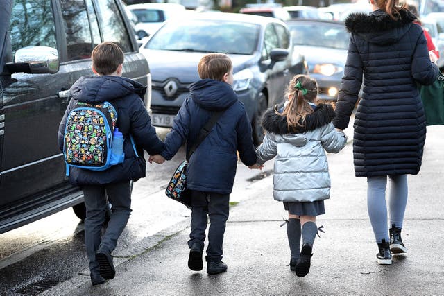 <p>Regular attendance at school for their children is becoming less of a priority for parents, according to a report (PA)</p>