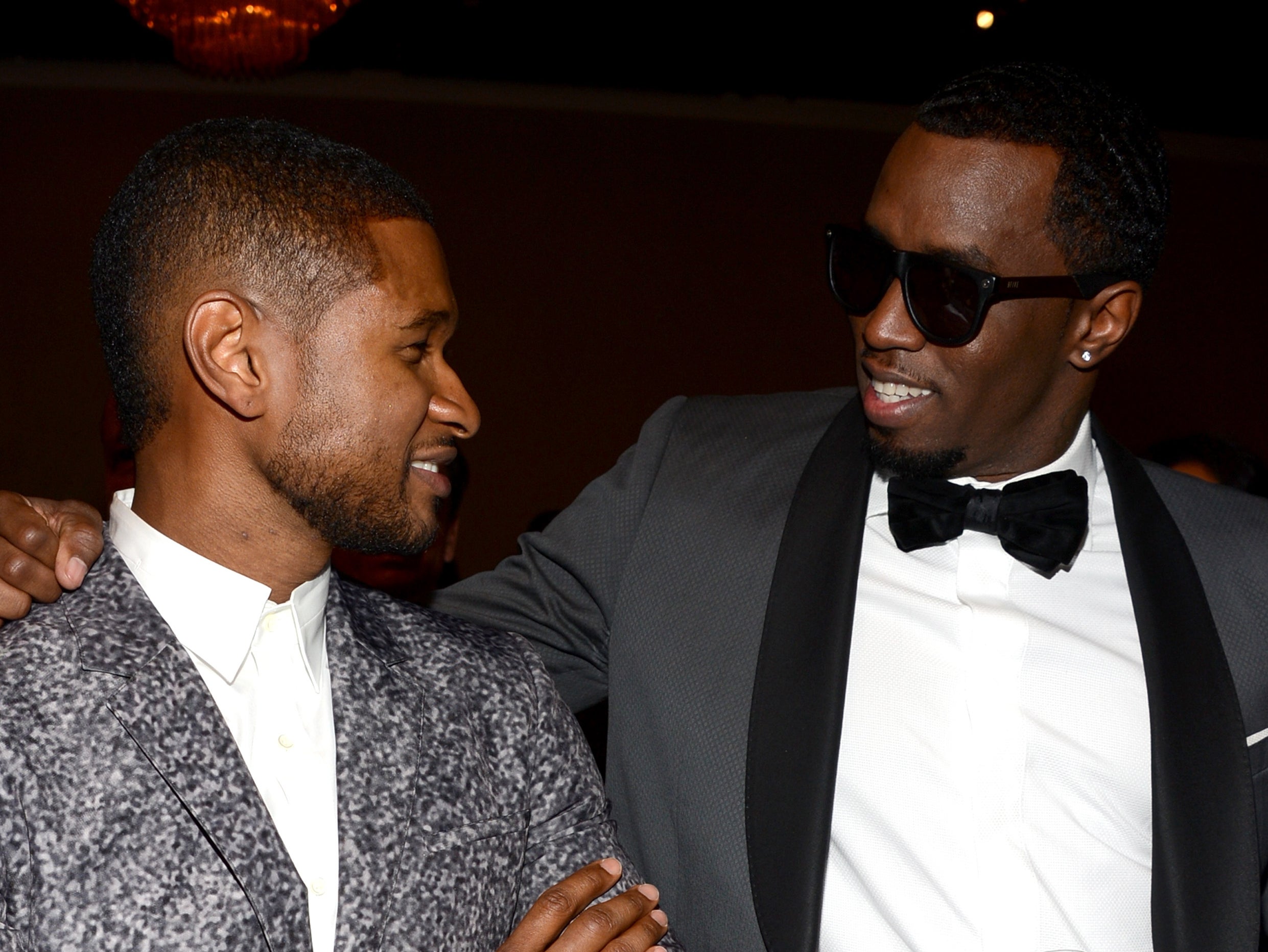 Usher y Diddy en un homenaje a L. A. Reid, en la fiesta previa a los premios Grammy, 2013