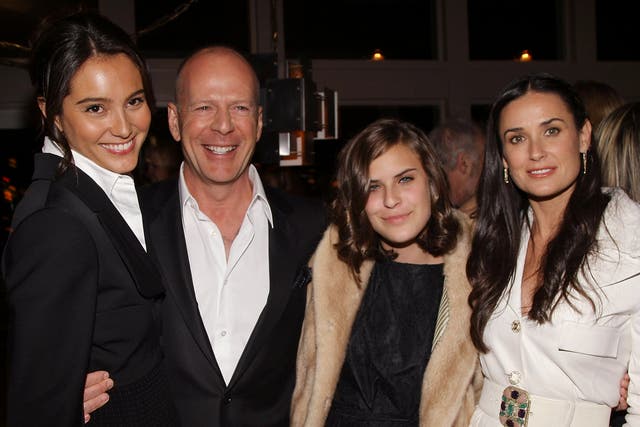 <p>Blended family: Willis with his wife Emma Heming, daughter Tallulah and ex-wife Demi Moore at a film premiere in 2008</p>