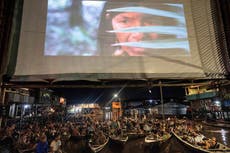 Festival de cine flotante busca rendir tributo a selvas del mundo en barrio de la Amazonía de Perú