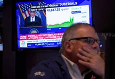 Wall Street cierra a la baja luego de que la Fed reduce su tasa de interés más de lo esperado