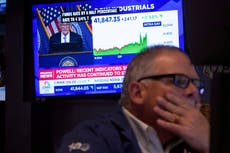 Wall Street cierra a la baja luego de que la Fed reduce su tasa de interés más de lo esperado