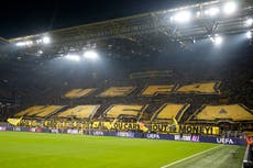 Hinchas de Borussia Dortmund repudian la nueva Liga de Campeones con pancartas