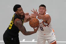 Booker anota 31 y lleva a Suns a una victoria de 120-112 sobre Jazz en el inicio de la NBA Cup