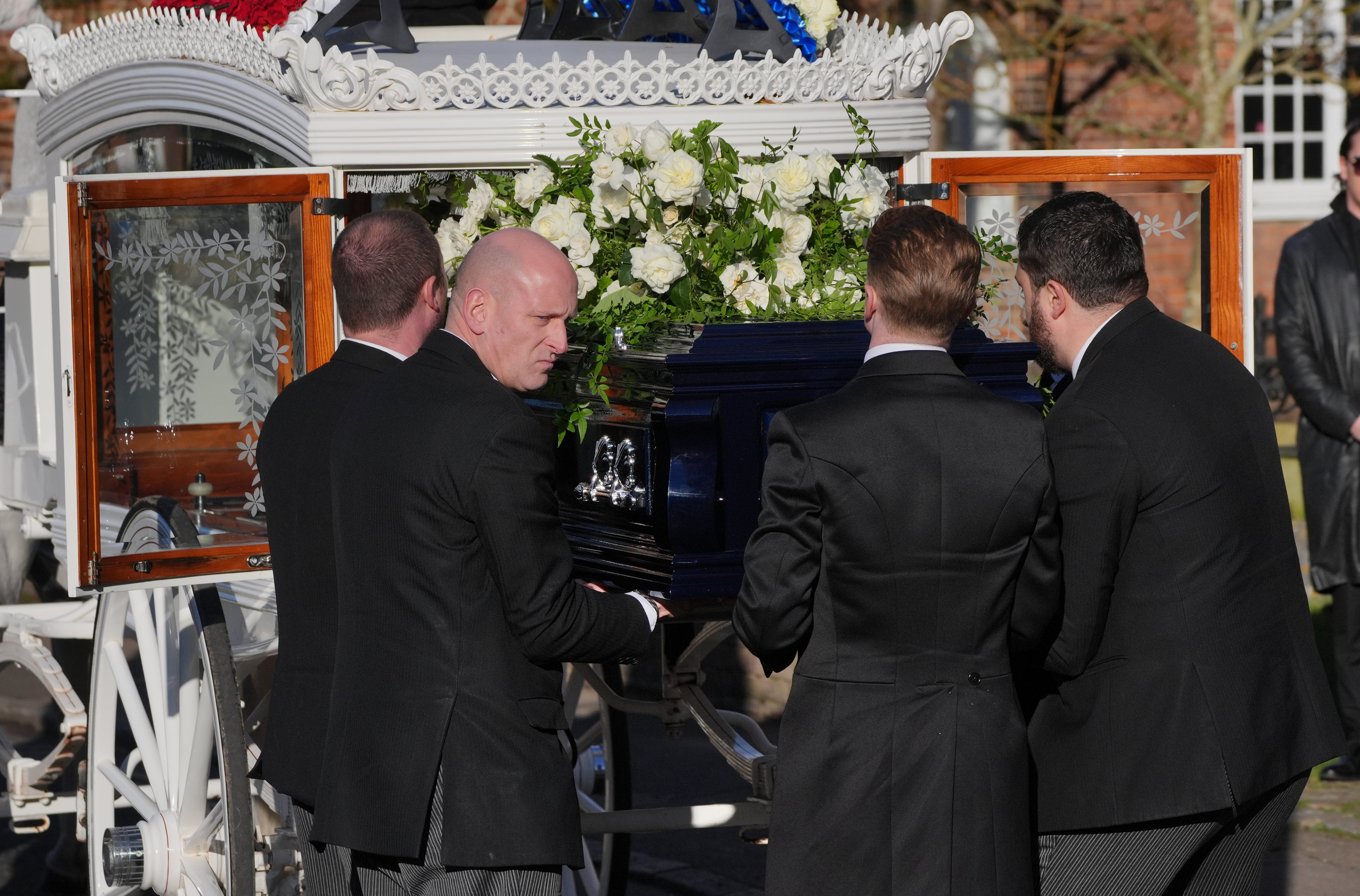 Pallbearers carried Payne’s coffin into the church (Jonathan Brady/PA)