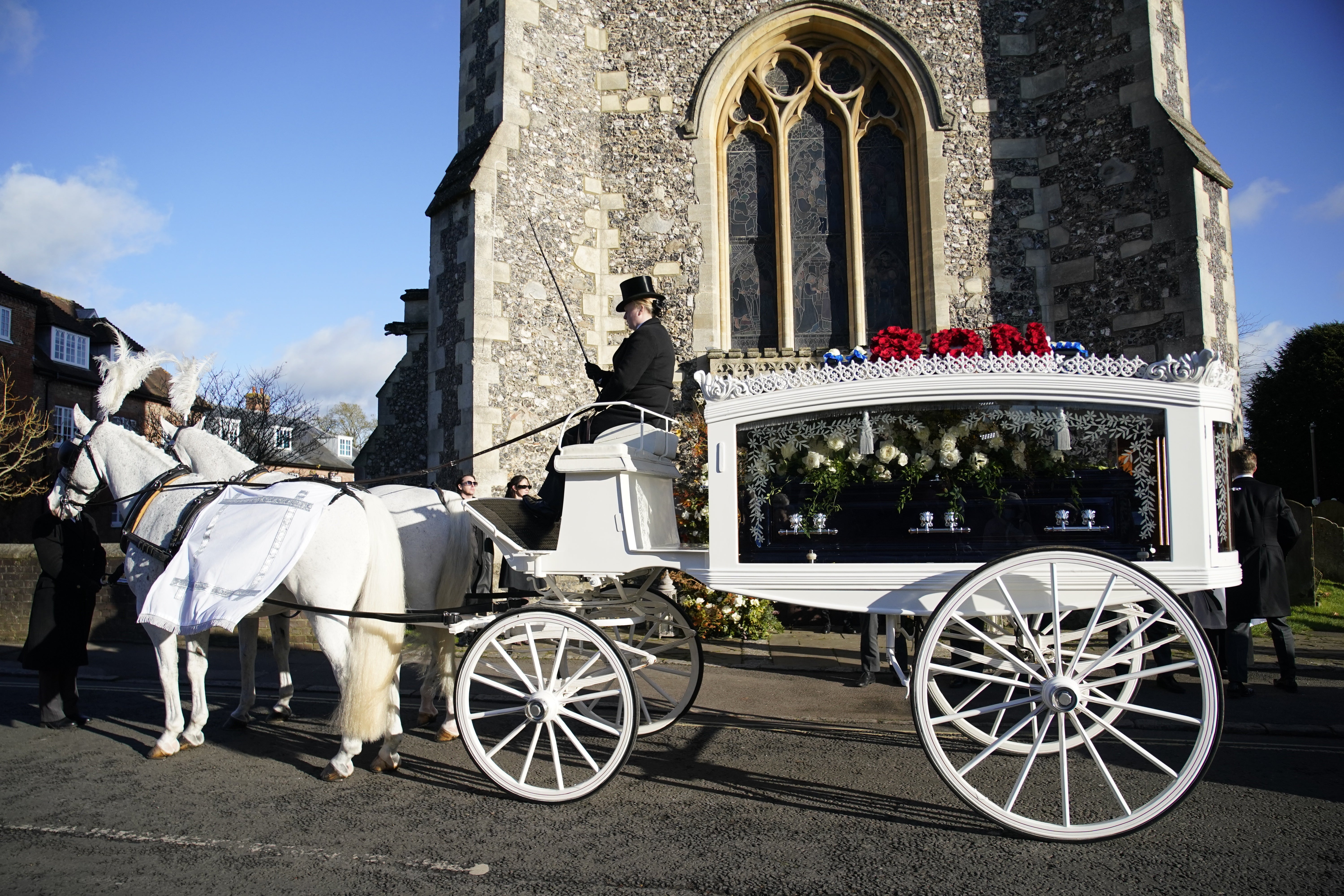 A horse-drawn carriage carrying the coffin of Liam Payne pulled up outside St Mary’s Church in Amersham, Buckinghamshire (Andrew Matthews/PA)