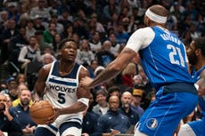 Edwards aporta 26 puntos y Wolves vencen a Mavs por 105-99 tras lesión de Doncic