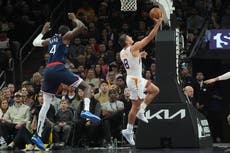 Devin Booker anota 26 y los Suns superan un susto tardío para vencer 111-109 a los Clippers