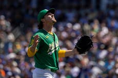 Ginn lanza 5 sólidas entradas y guía a Atléticos hacia triunfo de 3-1 sobre Mets