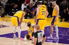 LeBron James se lesiona un ligamento de la rodilla en la derrota de Lakers ante Wolves, según AP