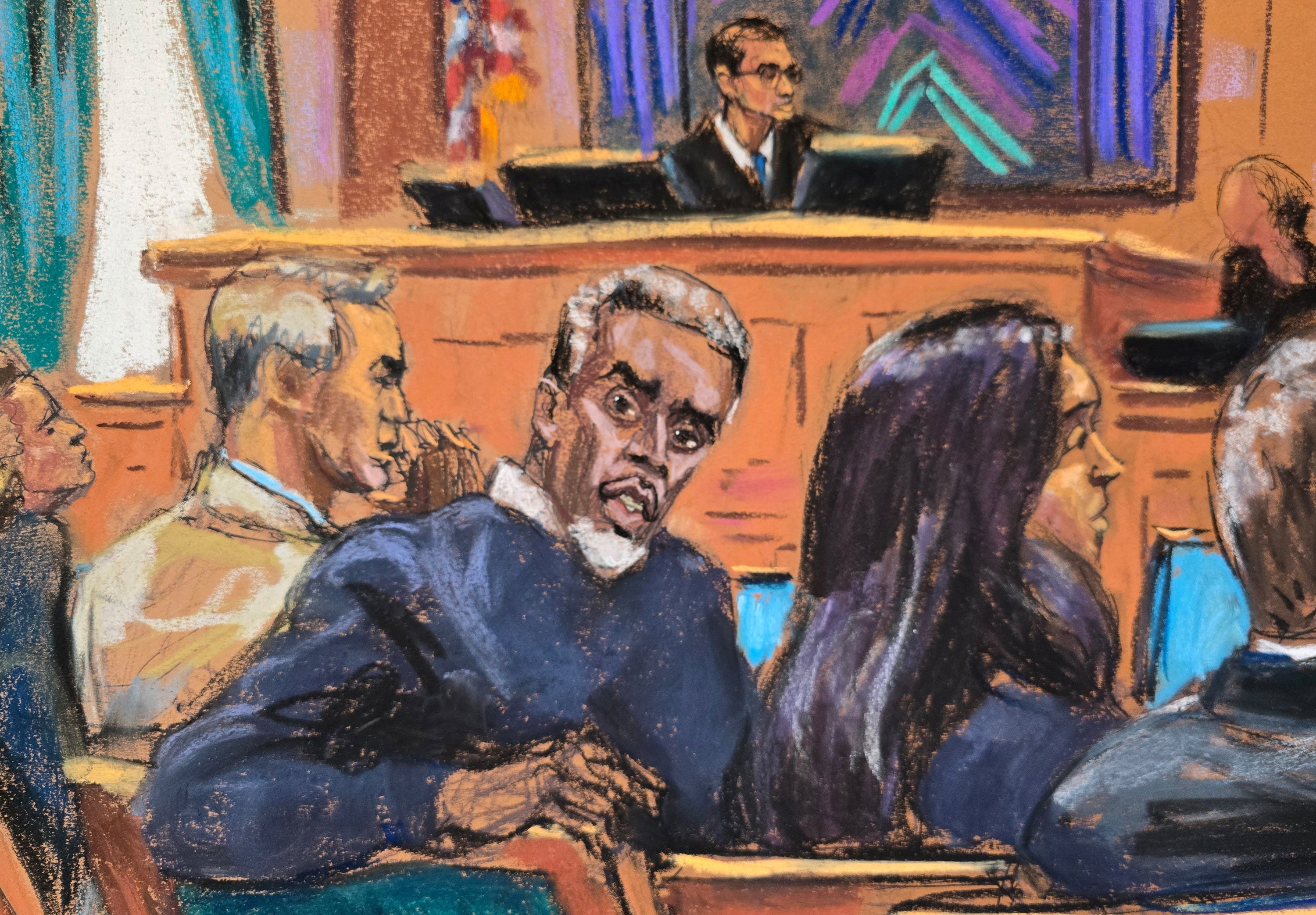 El juez de distrito Arun Subramanian entrevista a posibles miembros del jurado mientras Sean “Diddy” Combs se sienta con su equipo legal, al comienzo de su juicio por tráfico sexual en Nueva York