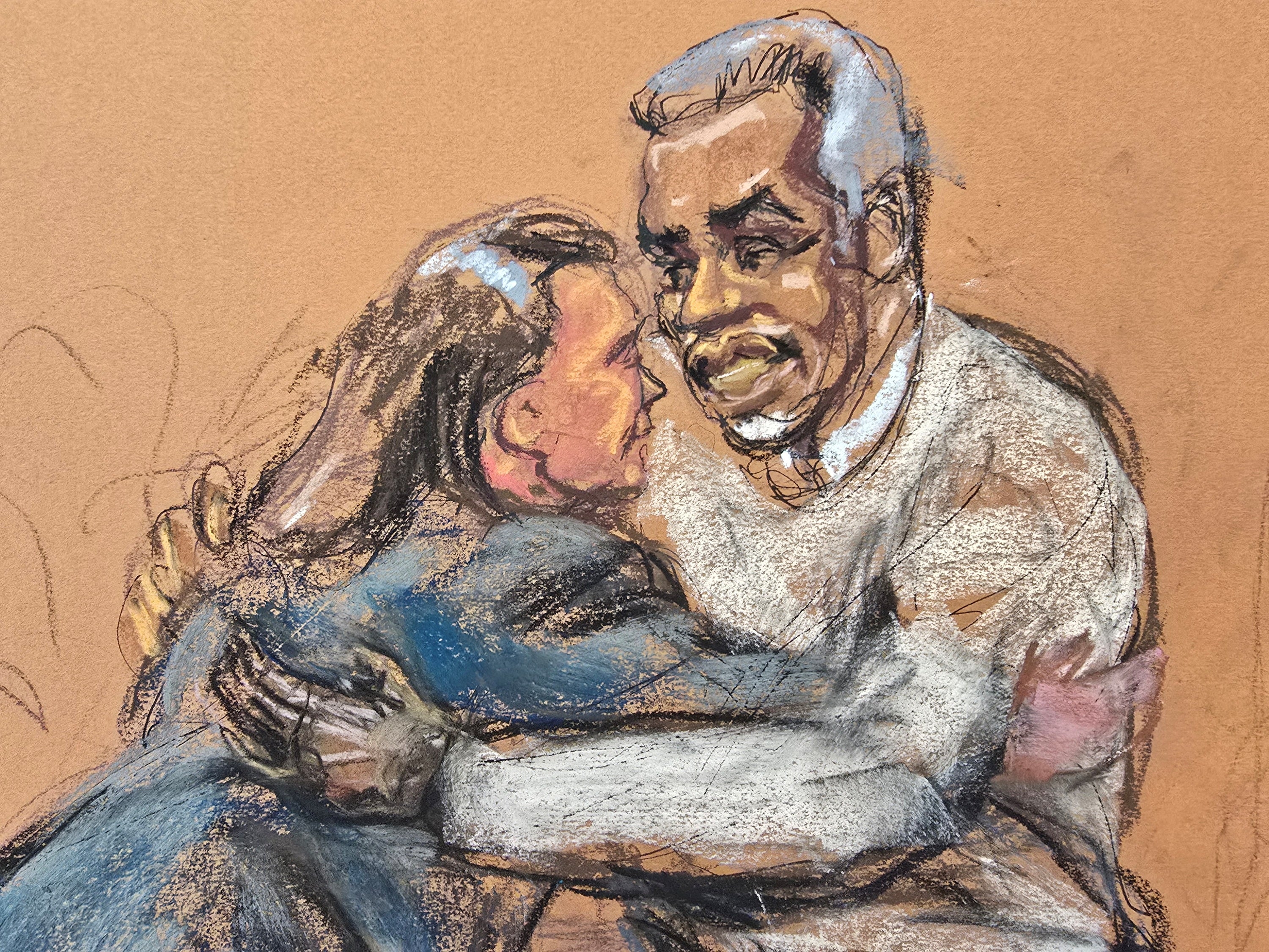 Diddy abraza a la abogada Estevao durante su juicio