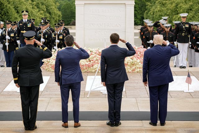 <p>U.S. President Donald Trump and Defense Secretary Pete Hegseth salute by the Tomb of the Unknown Soldier, during ceremonies in commemoration of the Memorial Day holiday, at Arlington National Cemetery in Arlington, Virginia, U.S., May 26, 2025. REUTERS/Ken Cedeno</p>