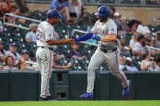 Higashioka impulsa 5 carreras en victoria de Rangers 16-4 sobre Mellizos