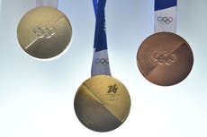 Medallas de los Juegos de Milán-Cortina simbolizan 'dos mitades que se unen'