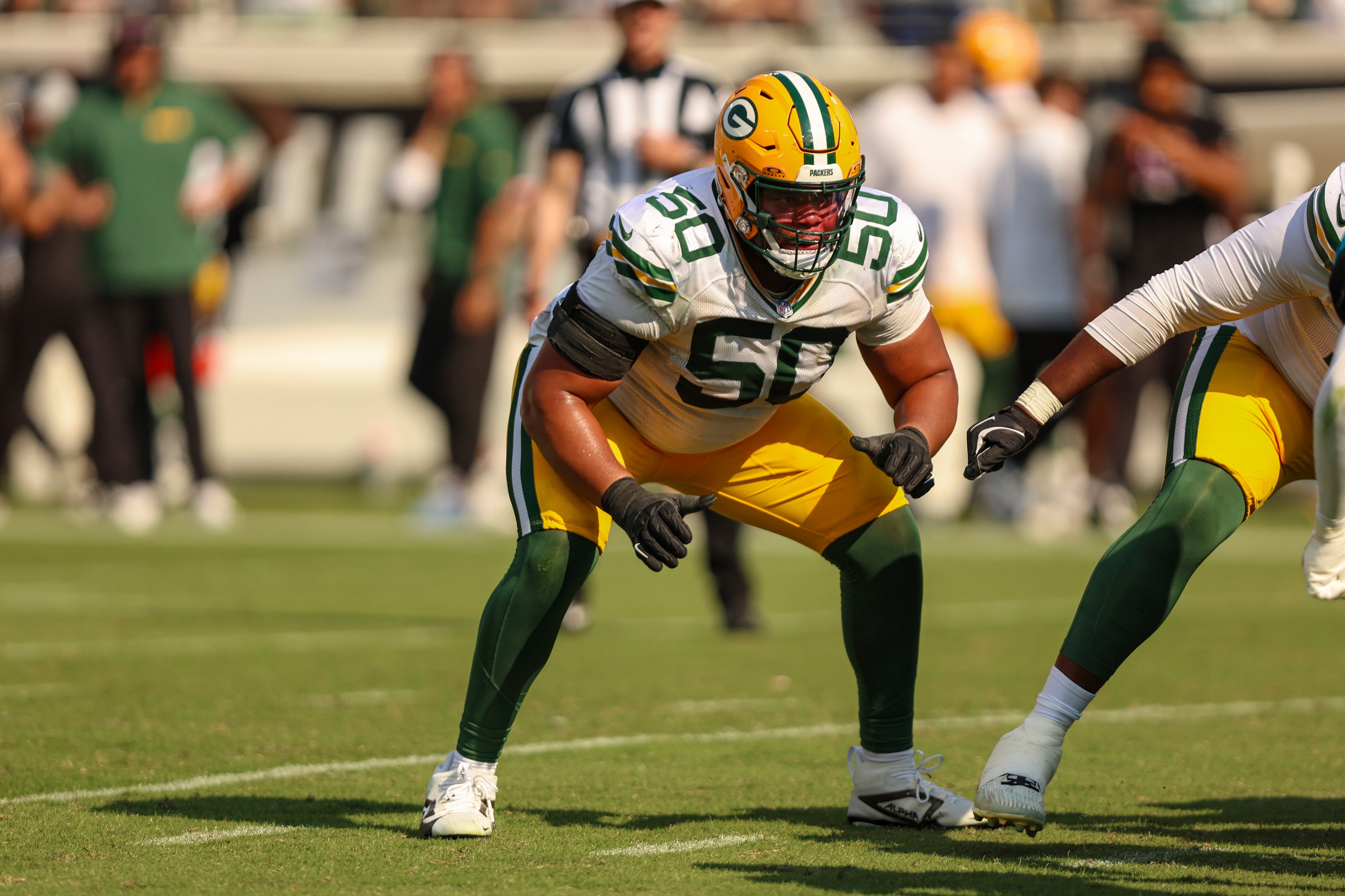 PACKERS TOM