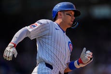 Suzuki y Horton ayudan a Cachorros a evitar barrida con victoria 6-1 sobre Rojos